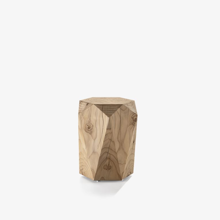 Stool made of a single block of scented cedar with hexagonal base